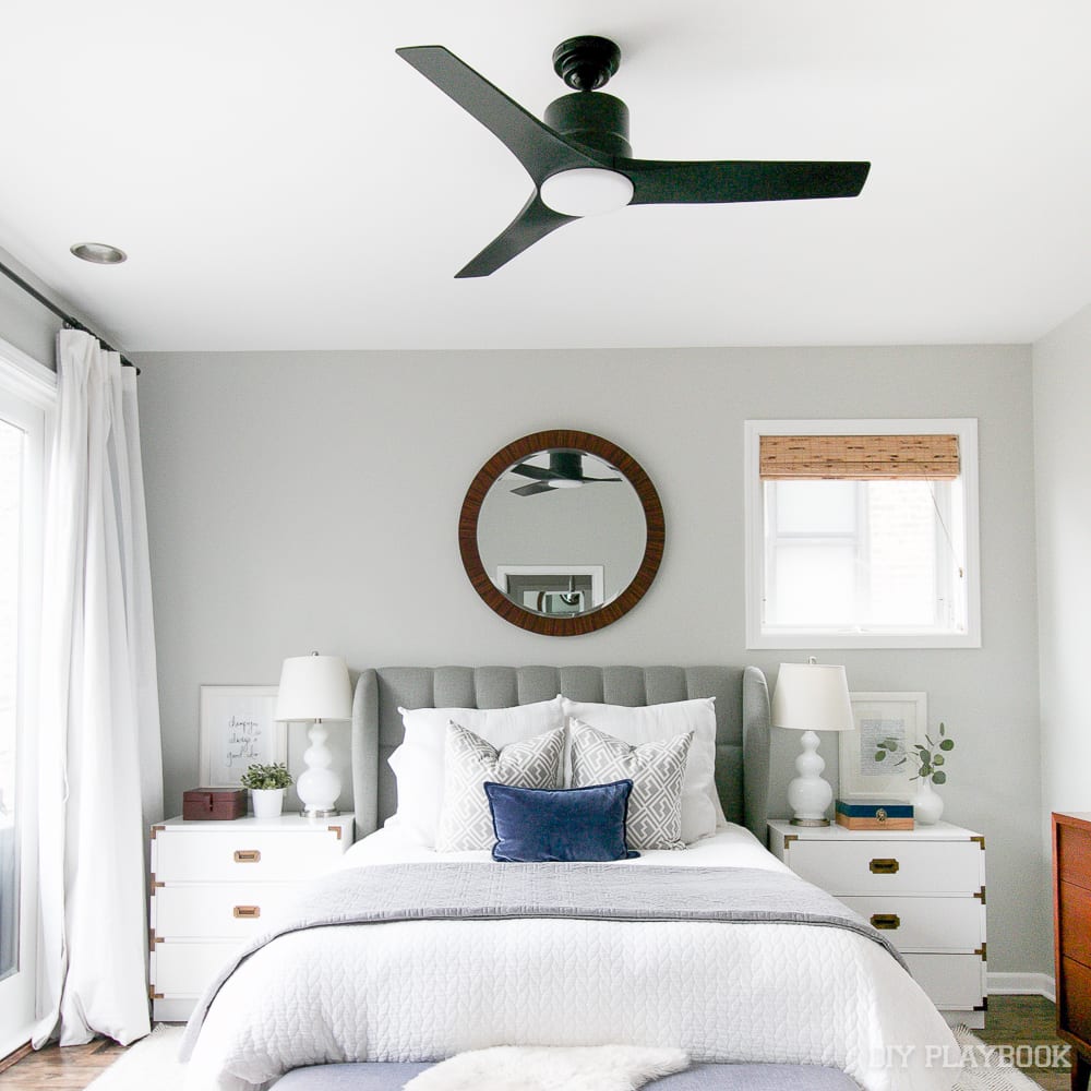 How amazing does our new ceiling fan look? You can totally tackle this project yourself, but be sure to read our tips on installing a celing fan before you do!
