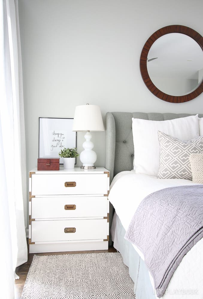 Nightstands are a great place for frames: 6 Ways to Decorate with Picture Frames | DIY Playbook