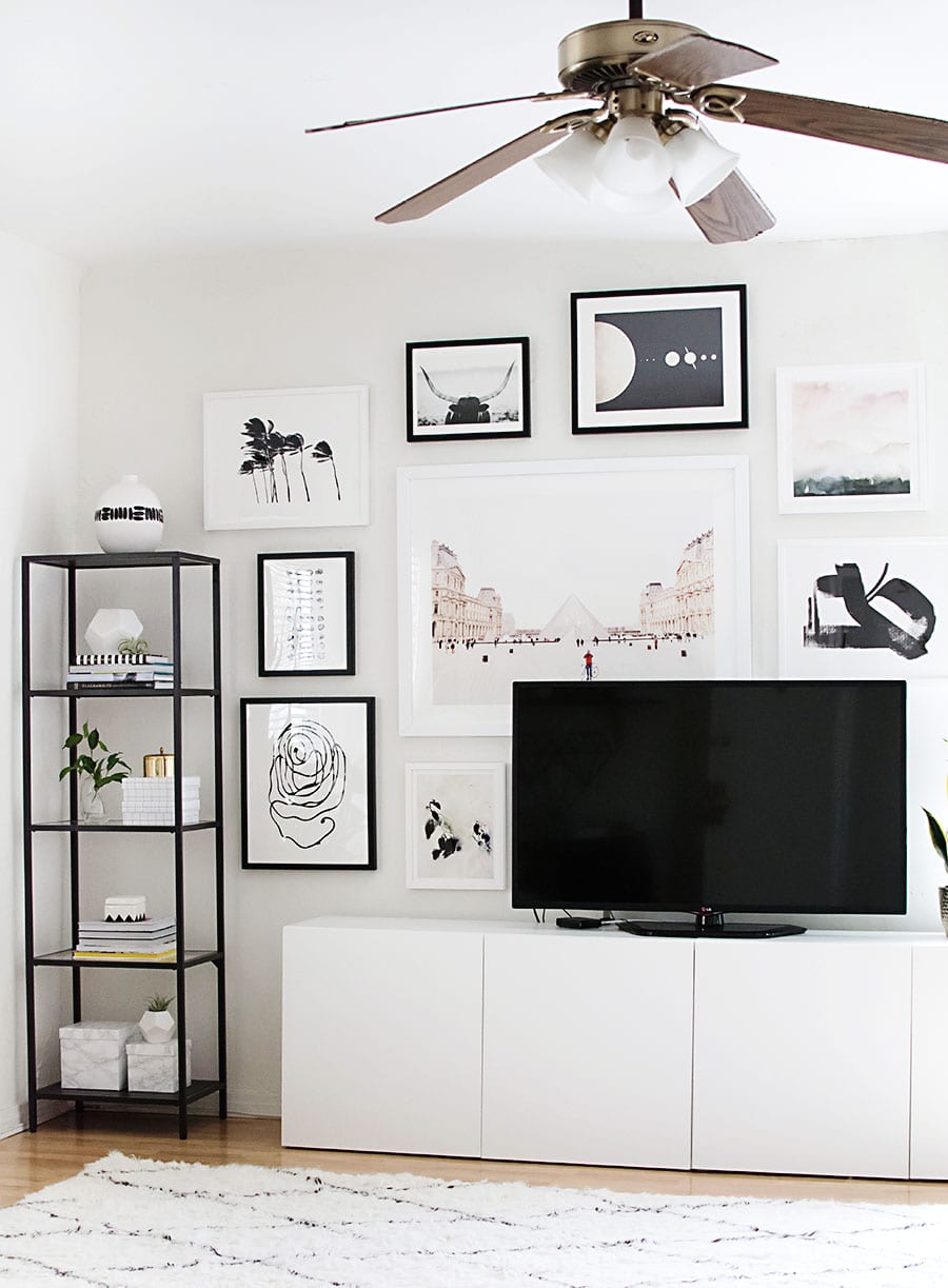 Black and White Gallery Wall designed around a TV - Photo from Homey oh My