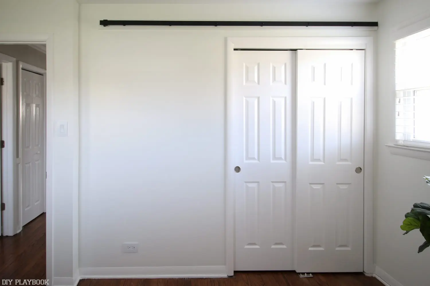 During: How to Hang a Barn Door in your Home DIY | DIY Playbook