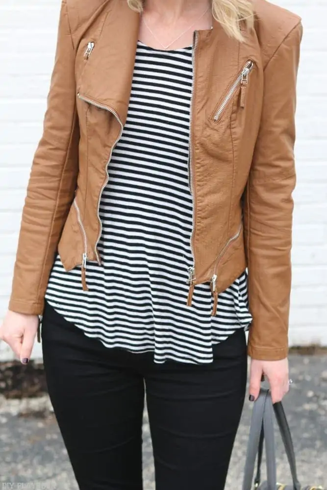 A simple black and white tank pairs great with the leather jacket
