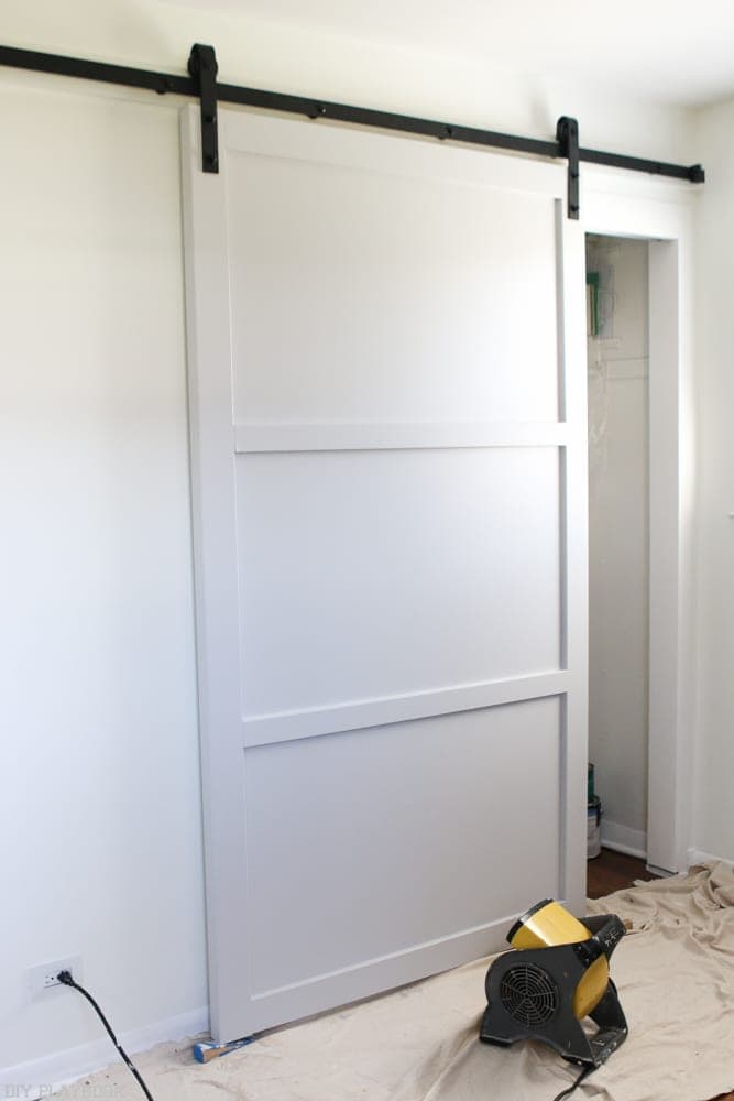 Paint the door: How to Hang a Barn Door in your Home DIY | DIY Playbook