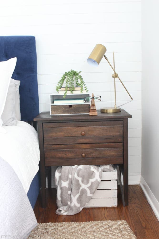 Love that board and batten look on the bedroom wall! Learn how it's done!