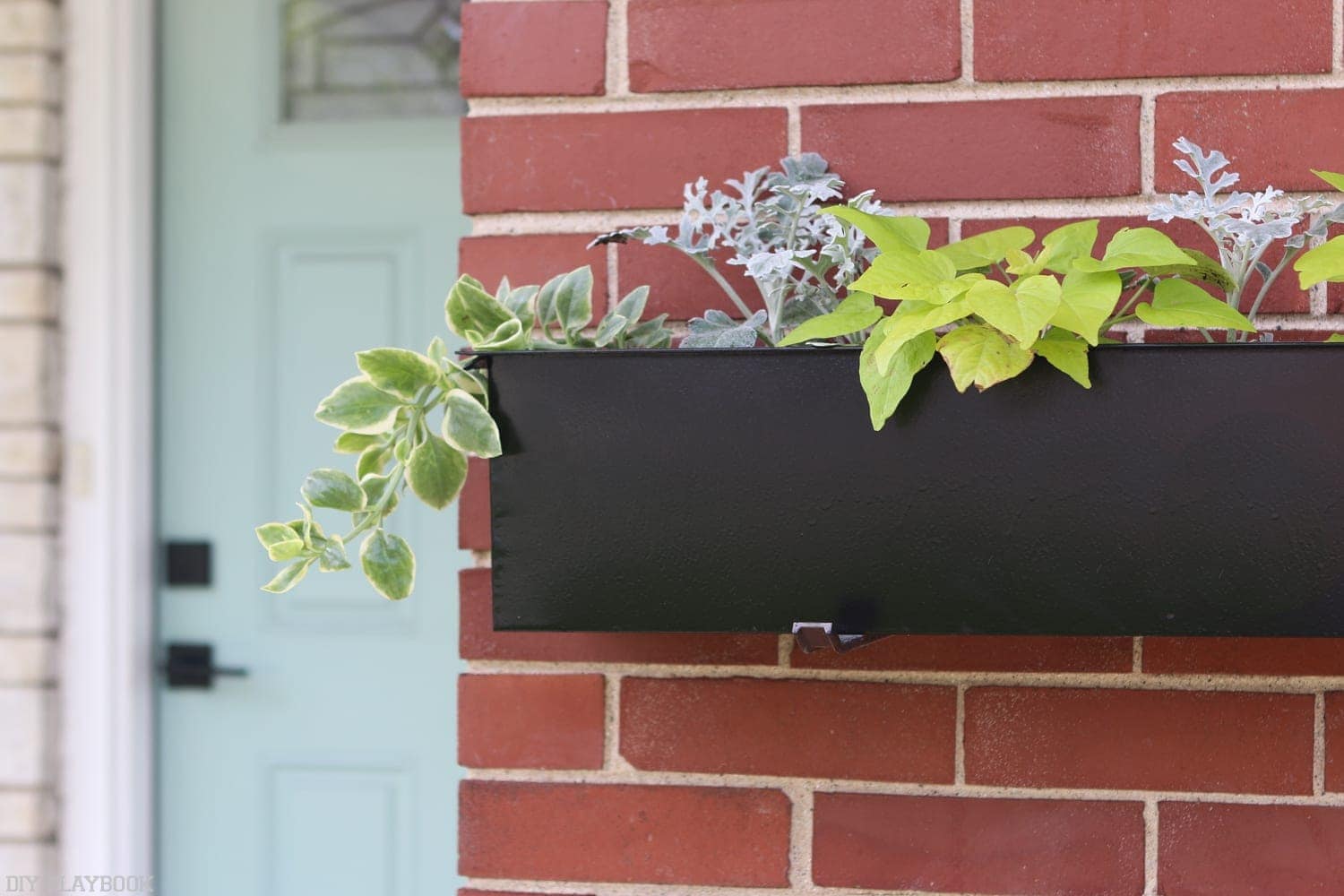 The black window boxes pair nicely with the new black handle