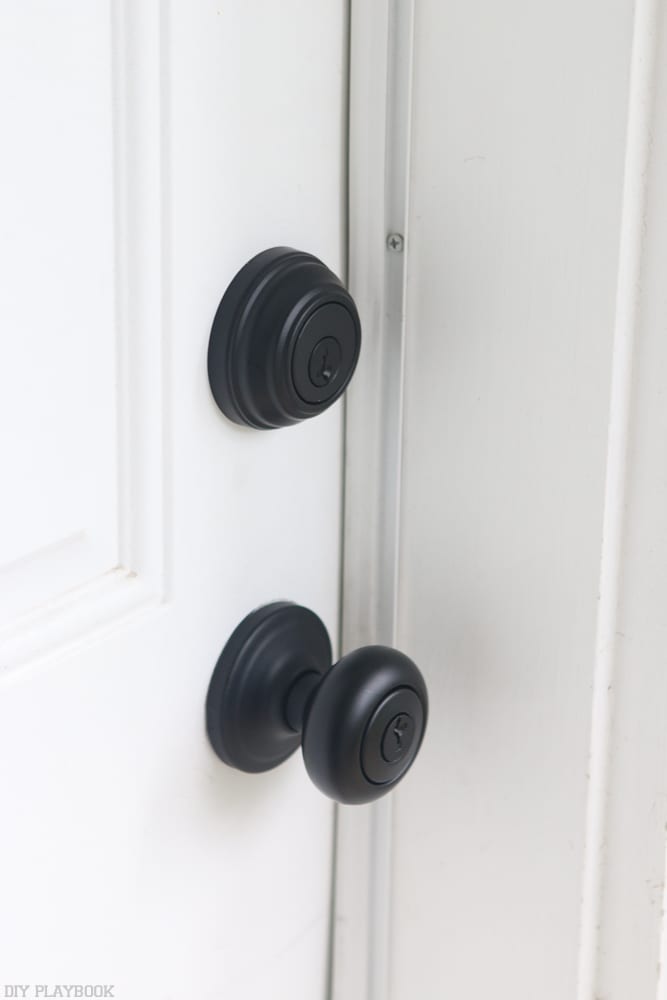 These black knobs and locks are sleek and transform any door