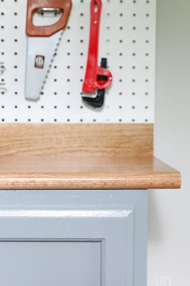 Stain the wood for a realistic look: DIY Kid's Tool Bench: Step by Step Tutorial | DIY Playbook