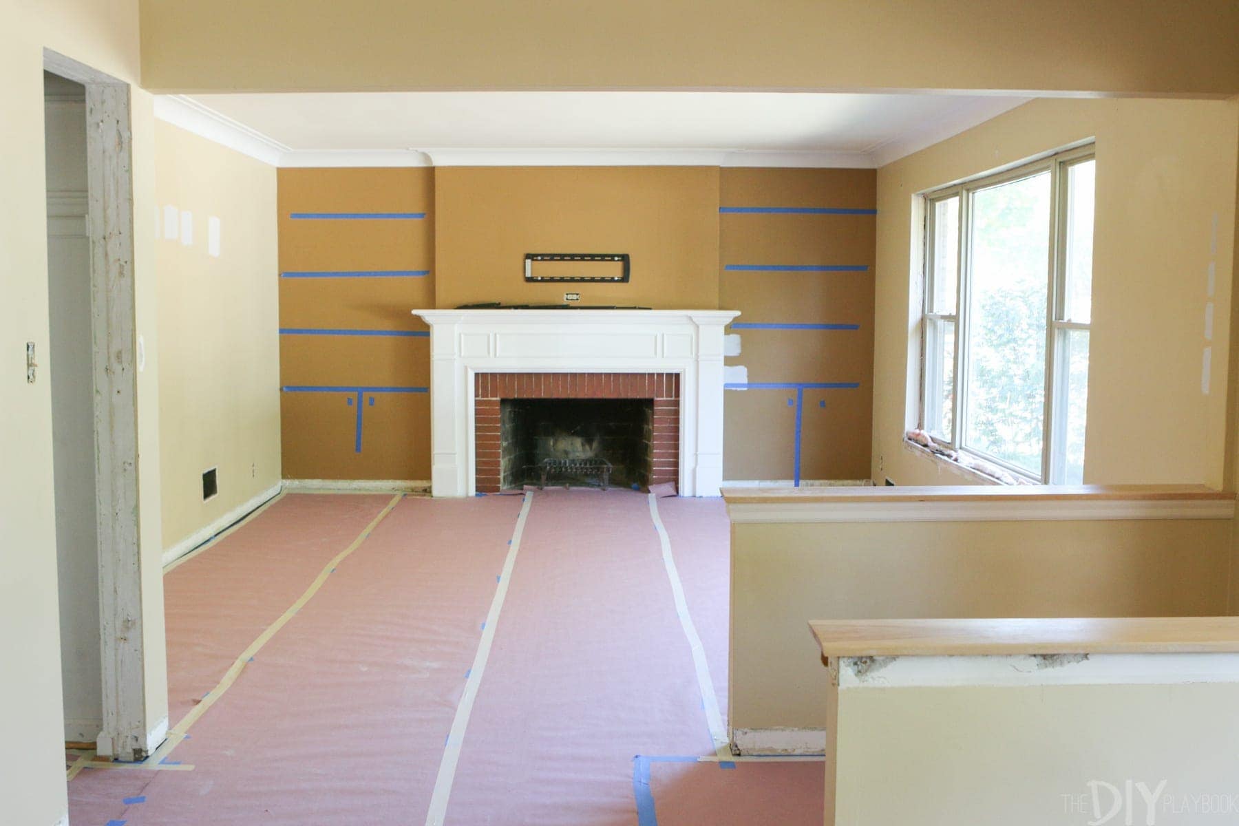Whte Built-Ins Around a Fireplace before