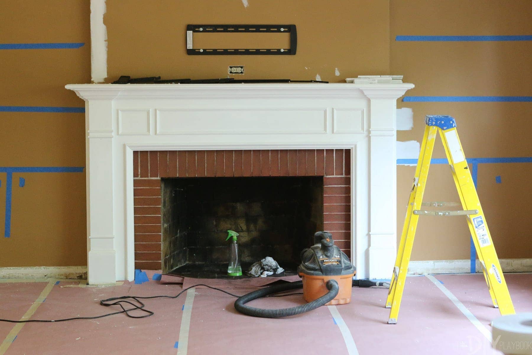 cleaning the interior of a fireplace