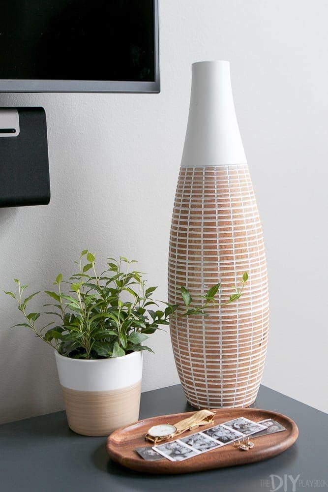 The decorative vase looks good with the plant.
