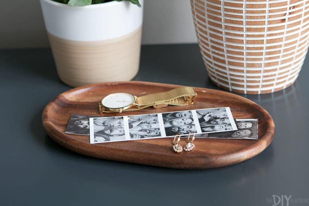 This small wooden plate is perfect for jewelry and other small items. 