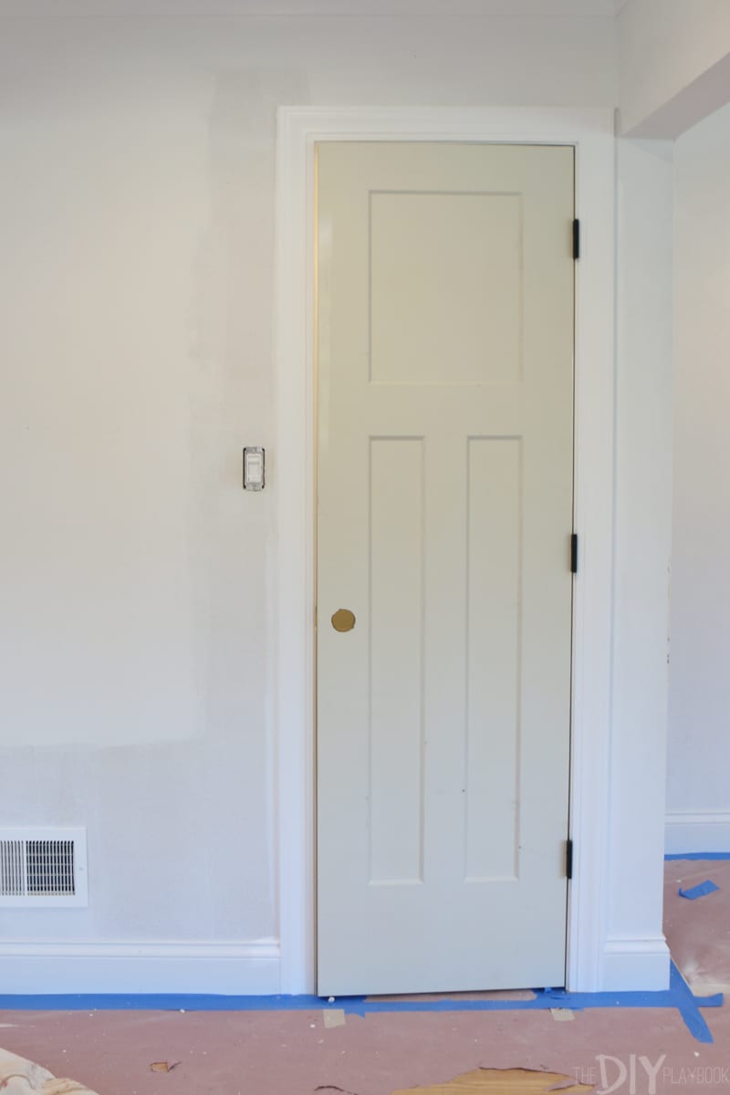 Hallway closet with new door and new paint.