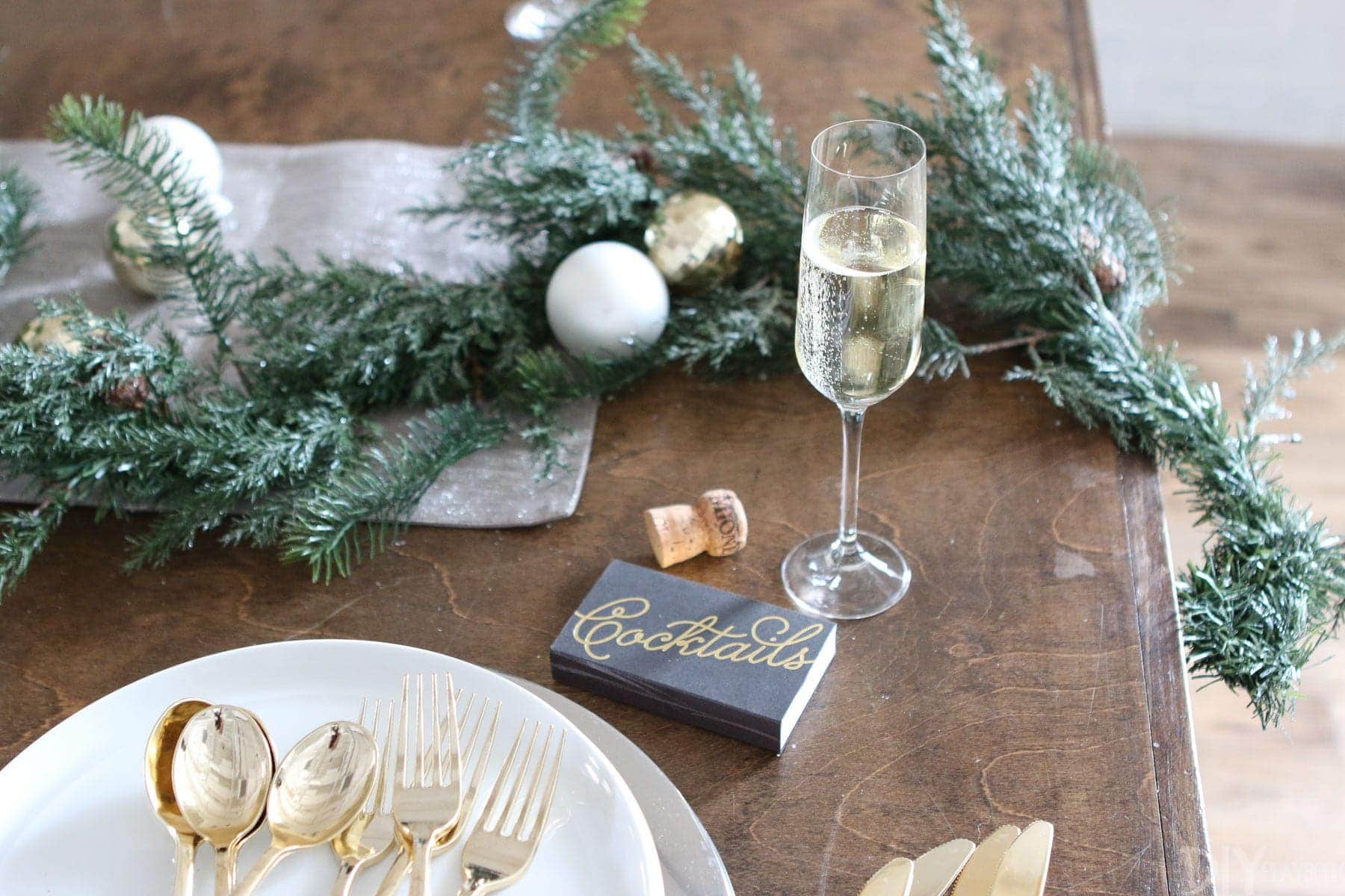 A glass of champagne on a holiday tablescape. 