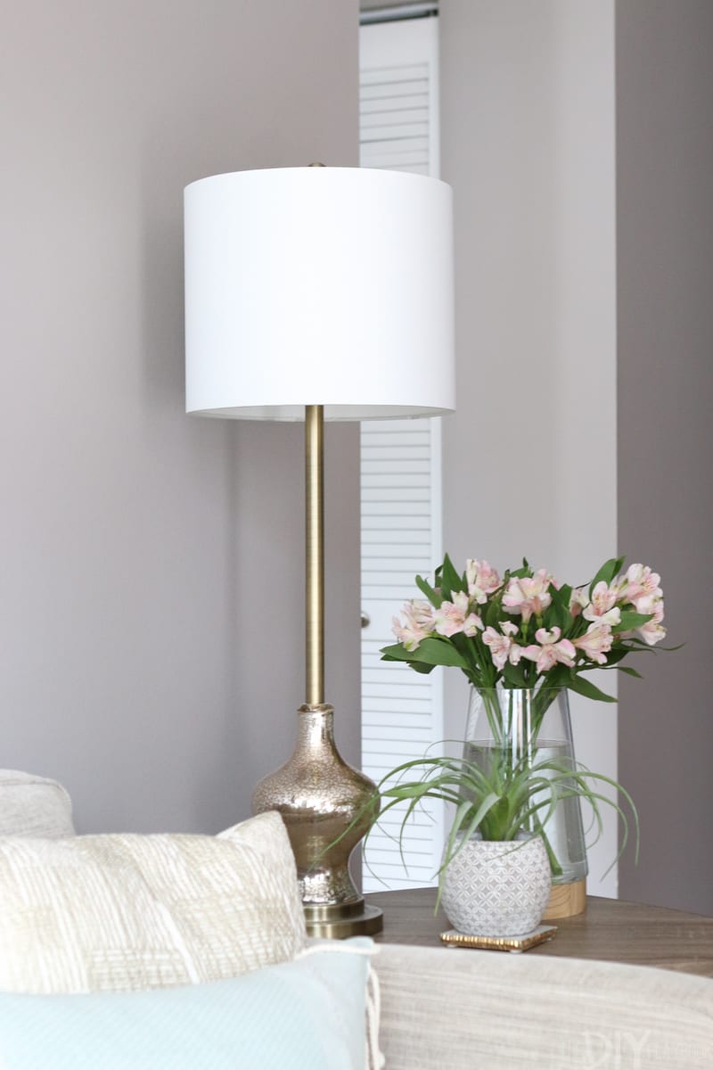 Vintage table lamps compliment the living room design.