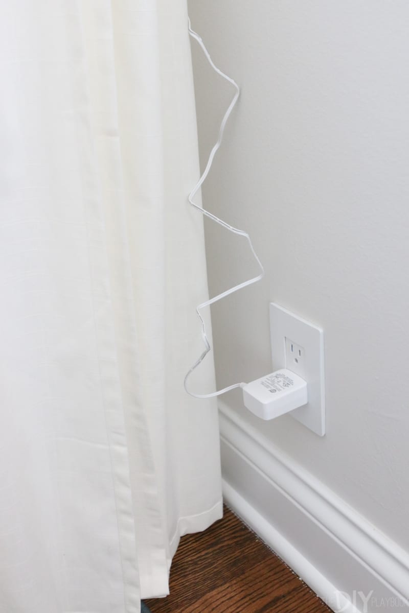 how to hide baby cord monitor behind a curtain