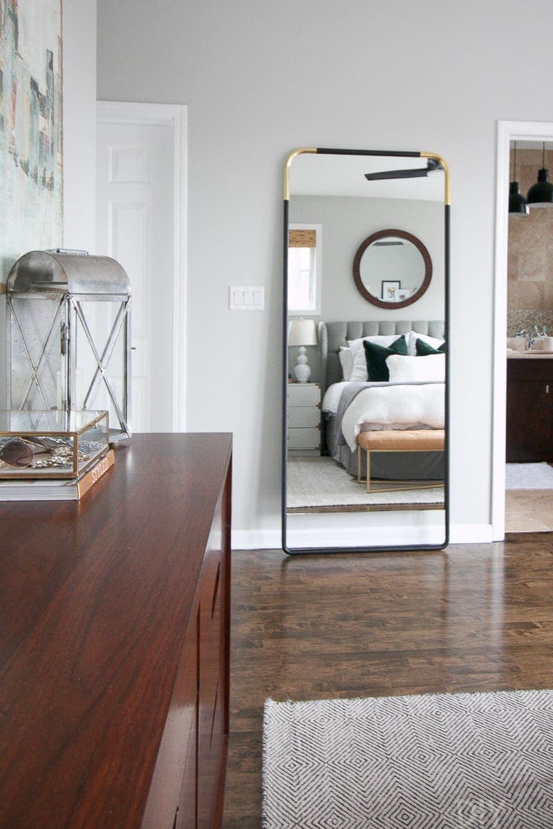 Tips to secure a leaning mirror to a wall in your master bedroom space. 