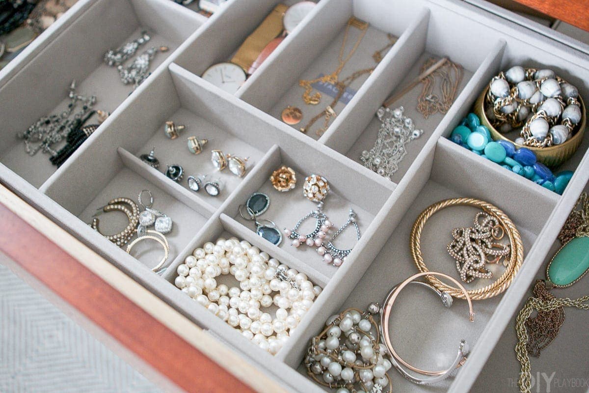 Jewelry drawer organizer to keep all of your pretty items on-hand and hidden away in a dresser. 