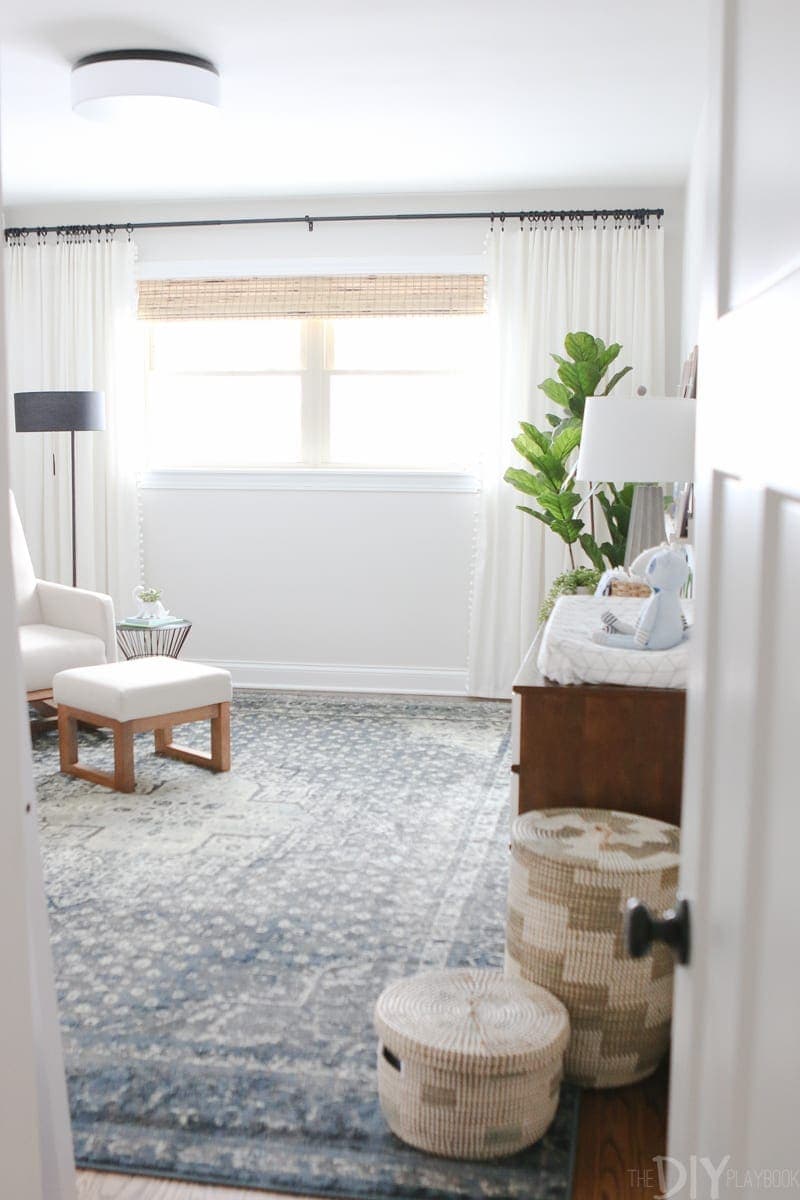 A large carpet like this adds a pop of color to the room.