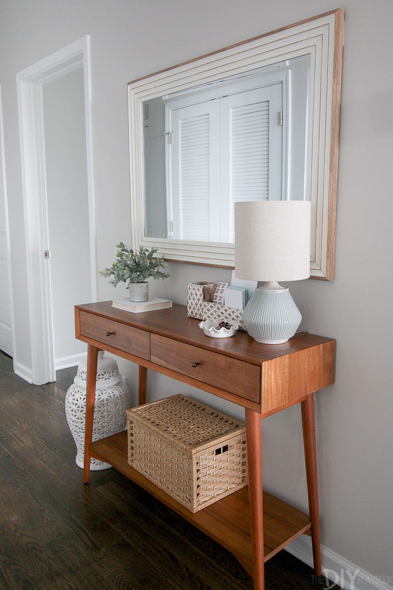 This west elm console fits perfectly in this blank hallway space