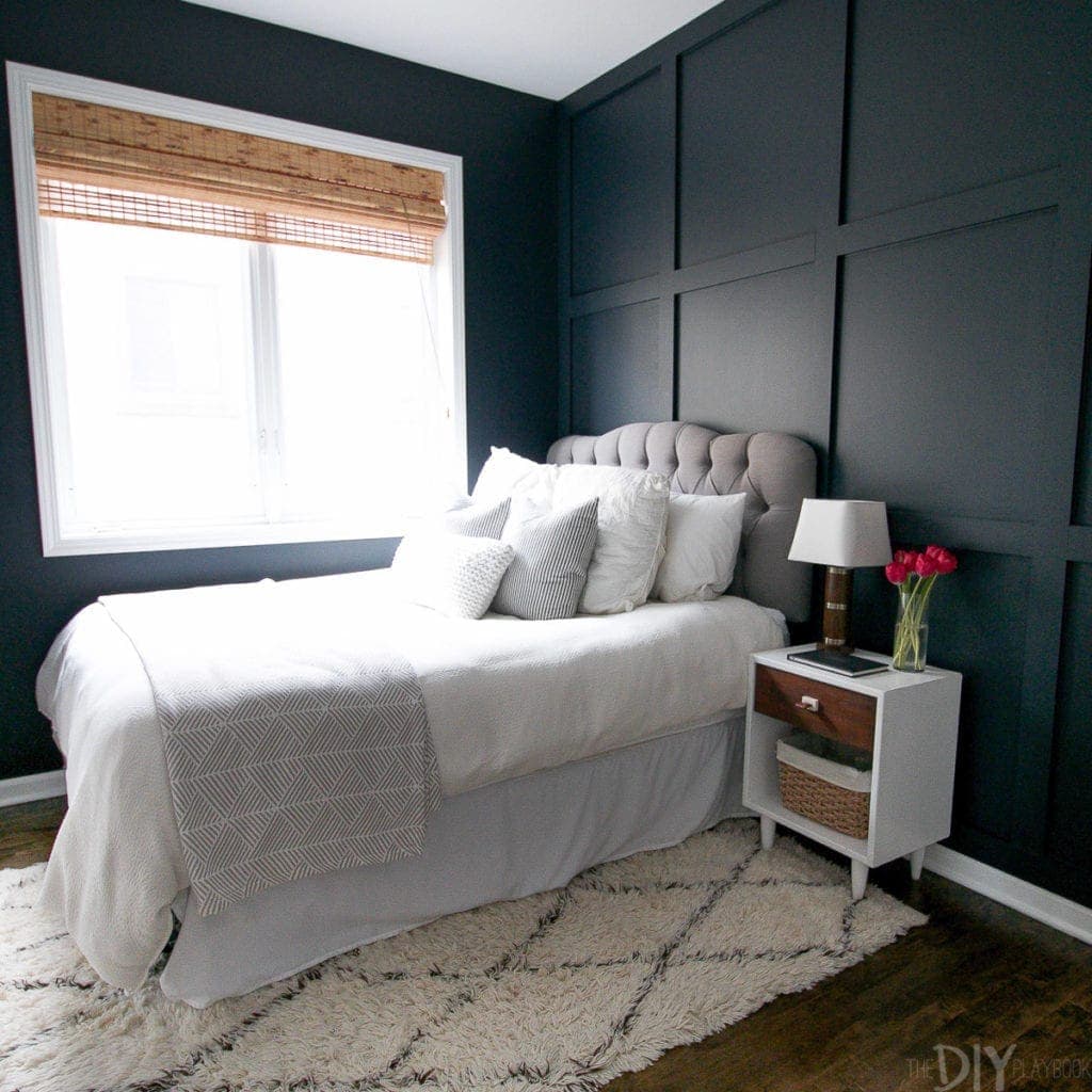 Guest bedroom painted the navy color Dutch Licorice