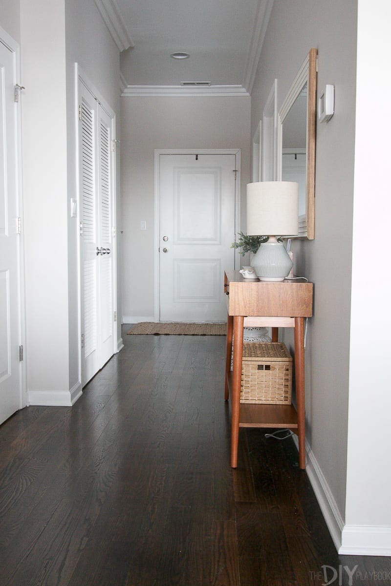 A slim console in a hallway makes for an easy entryway space. 