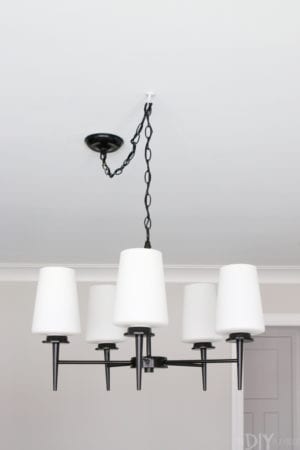 Spray Painting a Light Fixture Black For The Dining Room