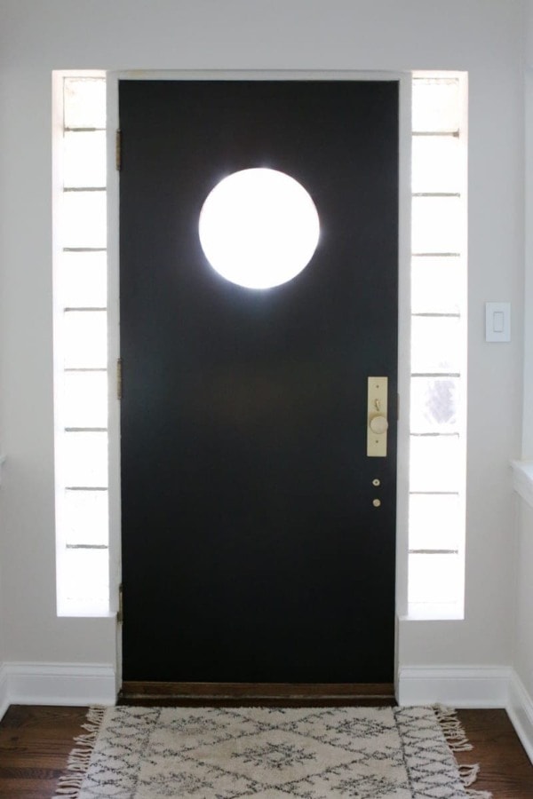 A Black Front Door with Satin Brass Hardware | The DIY Playbook