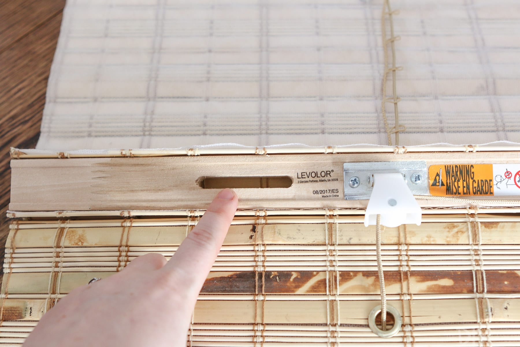 tutorial on how to hang bamboo shades the easy way