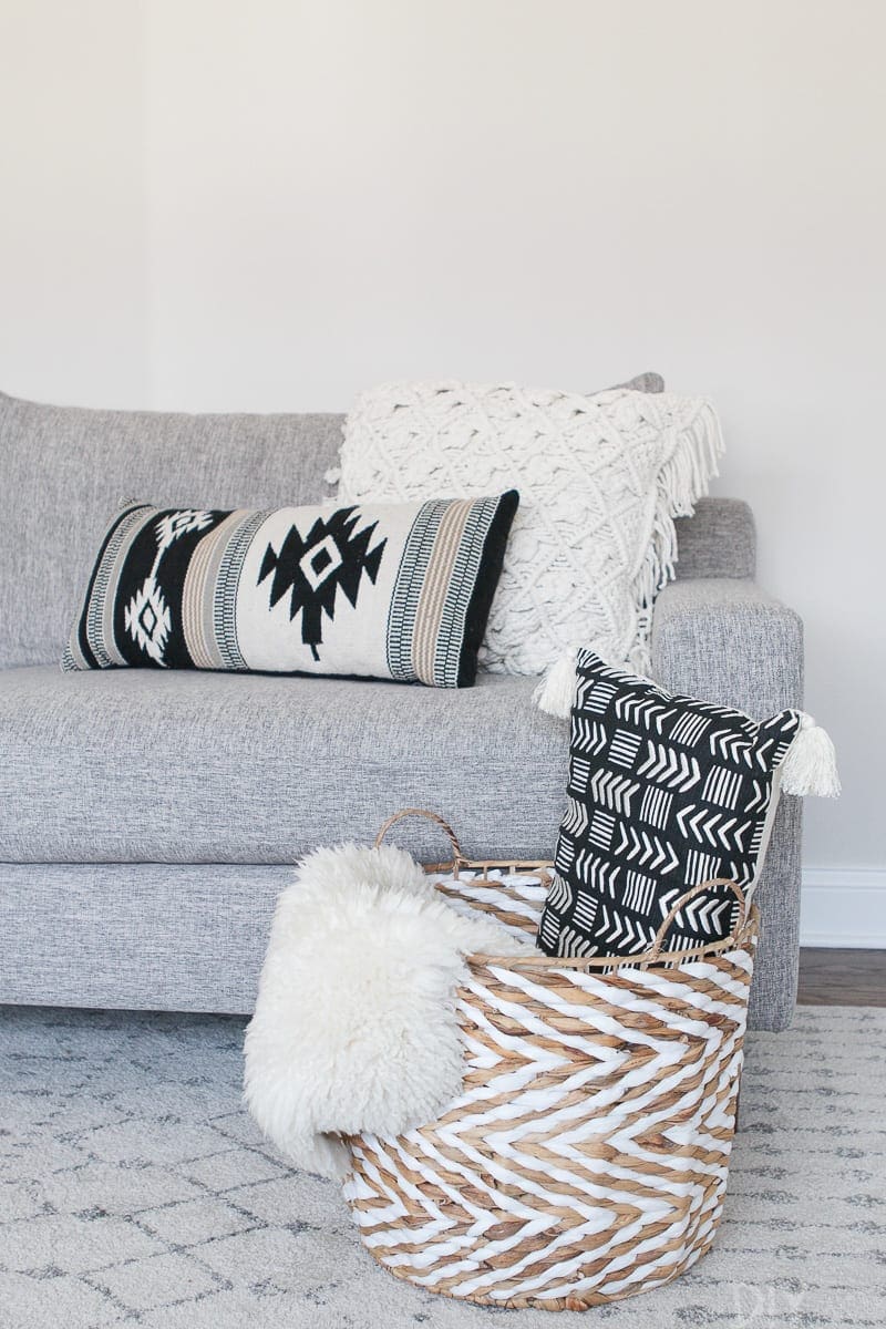 Decorative pillows with different patterns and textures compliment each other. 