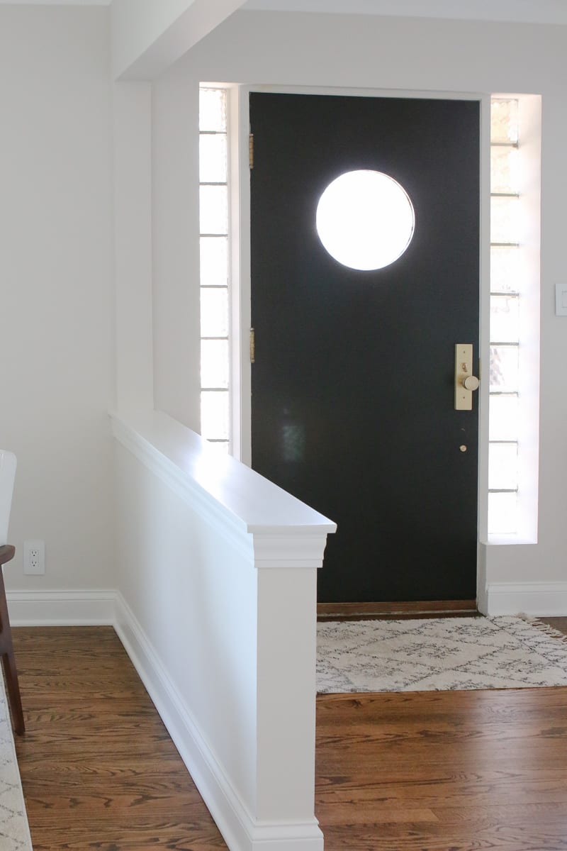 Painting the inside of your front door black with brass hardware