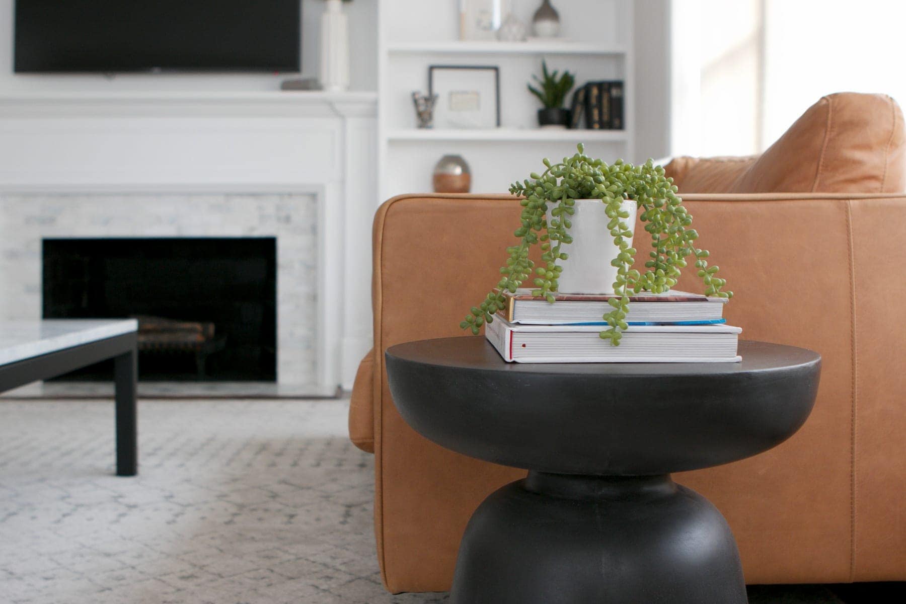 Add books and a plant to your side table for easy styling. 