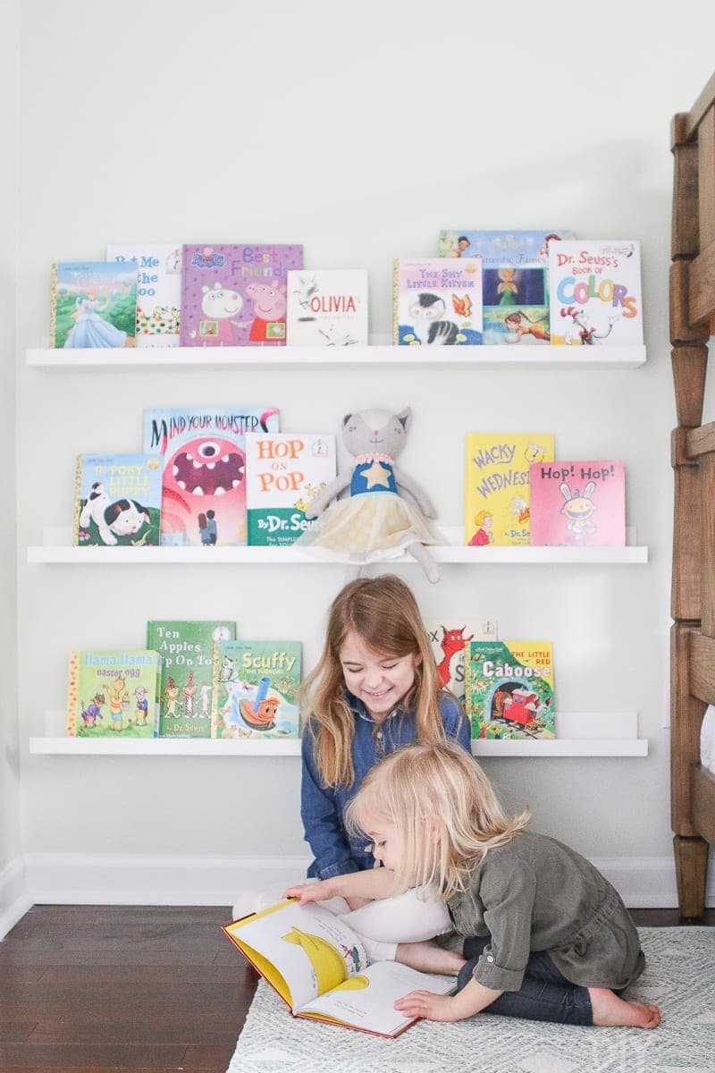 Kids love book ledges in a playroom for easy access to their favorite reads. 