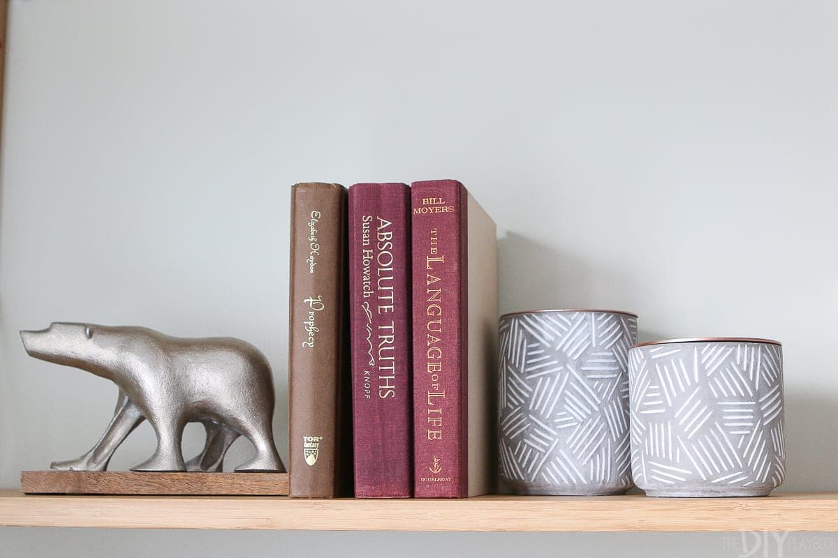 Sandwich hardcover books with cute objects for instant shelf decor. 