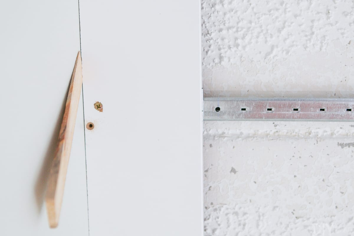 Use wood shims to ensure that 3/4 of a inch is left between the wall and the ceiling plank