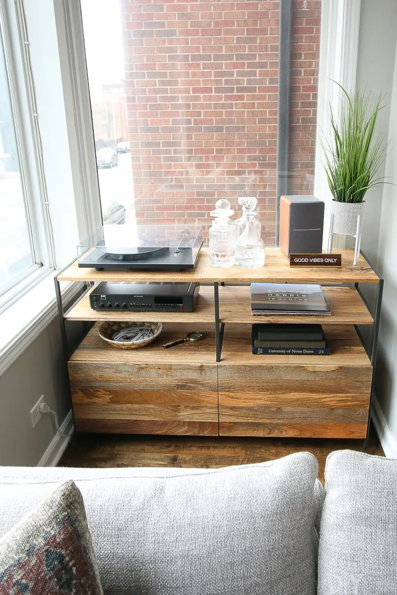 This small area holds a wood record console from West Elm perfectly