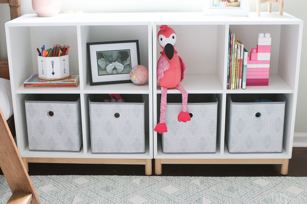 Use storage cubbies to corral toys and clutter in a kids' room