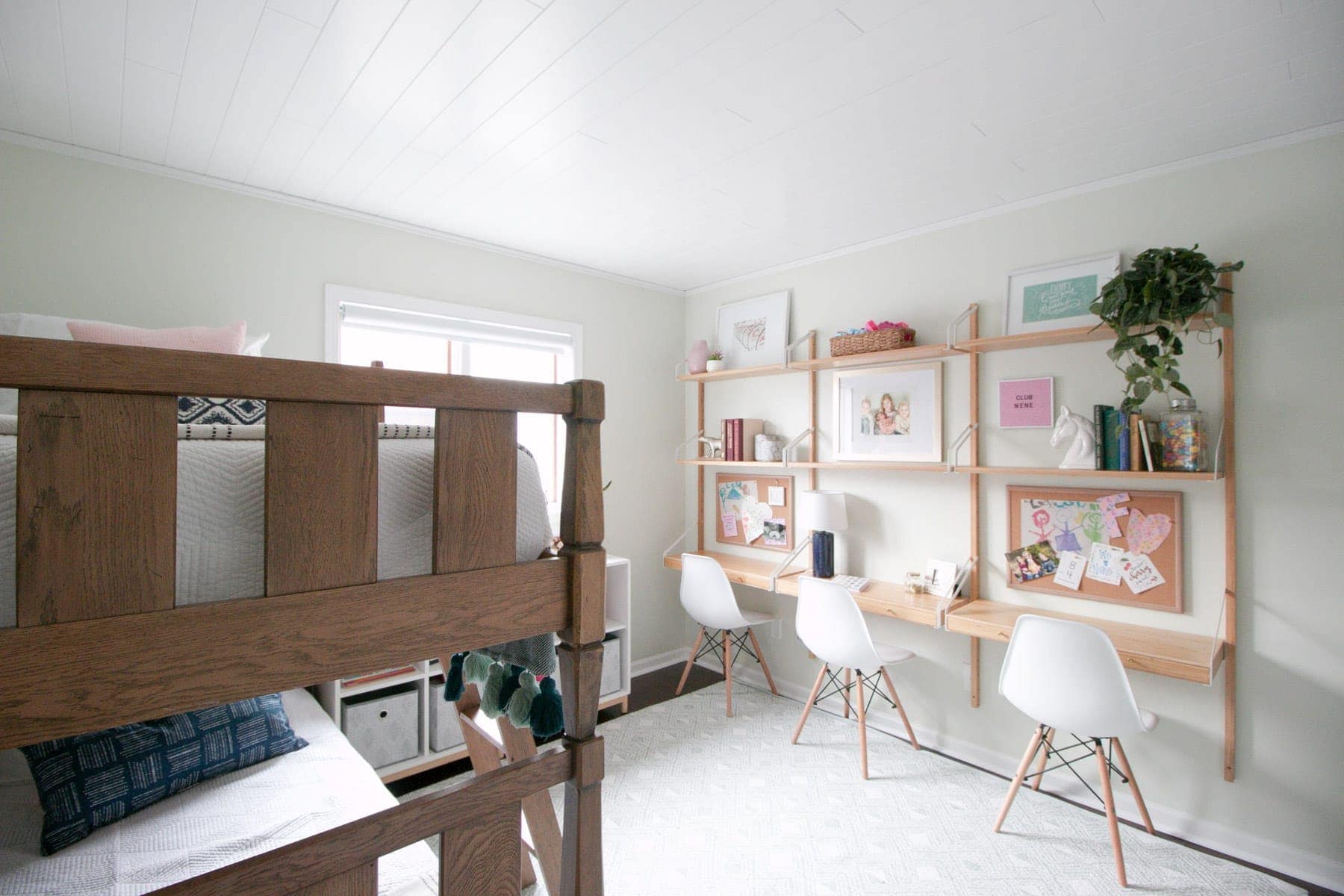 3 desks in a playroom of this kids' room makeover. 