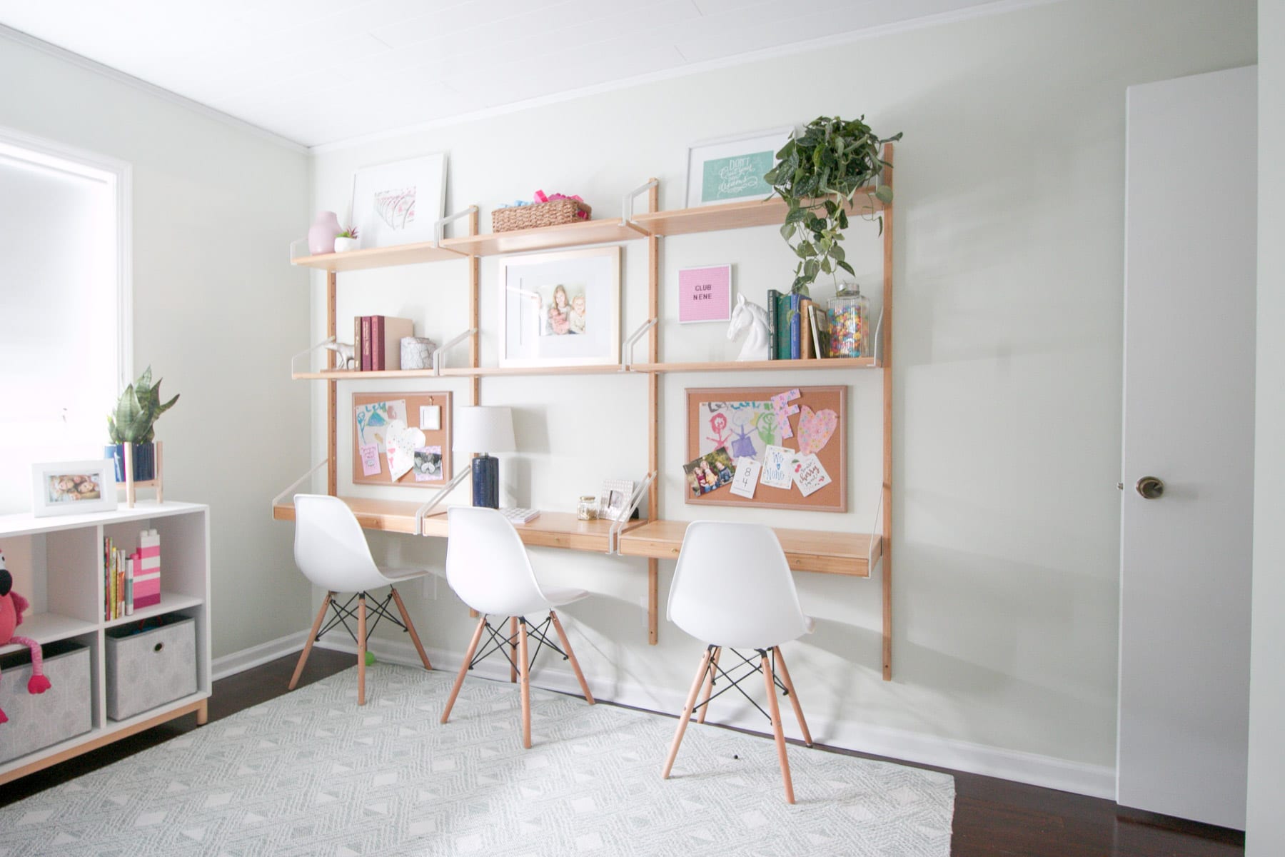 This wall system from Ikea is the perfect way to add 3 desks to this playroom