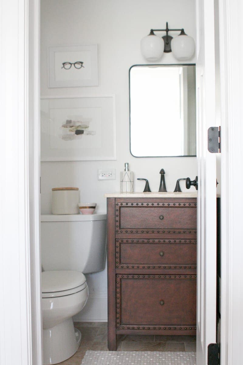 Make the most of an old half bath with accessories and frames