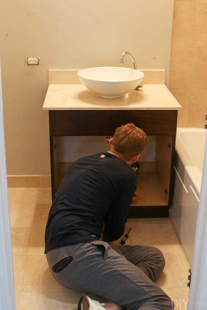 When removing a vanity, turn off the water and unhook the hot and cold water supplies