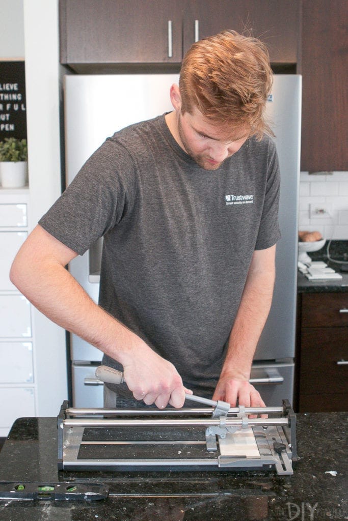 Use a tile cutter to make easy cuts