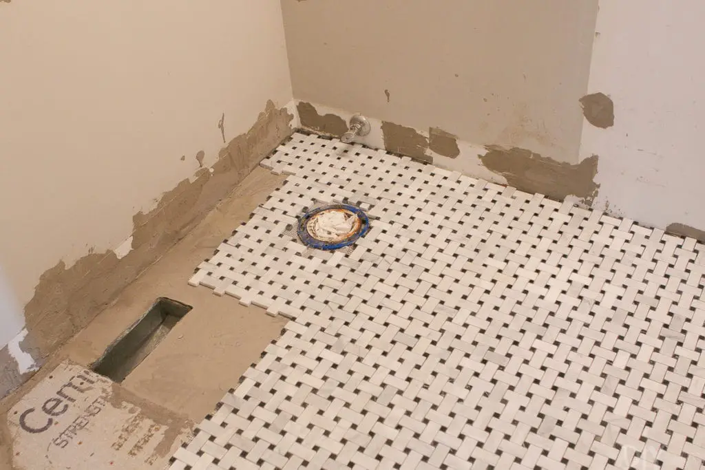 Apply thinset to the floor when laying floor tile
