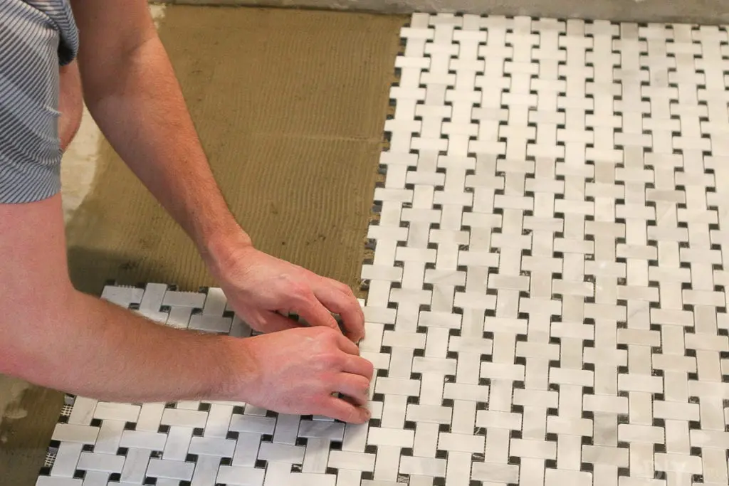 Go slowly when installing your marble basketweave floor tile