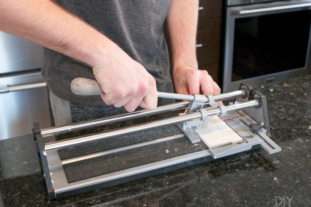 A tile cutter is only $20 and comes in handy when installing subway tile