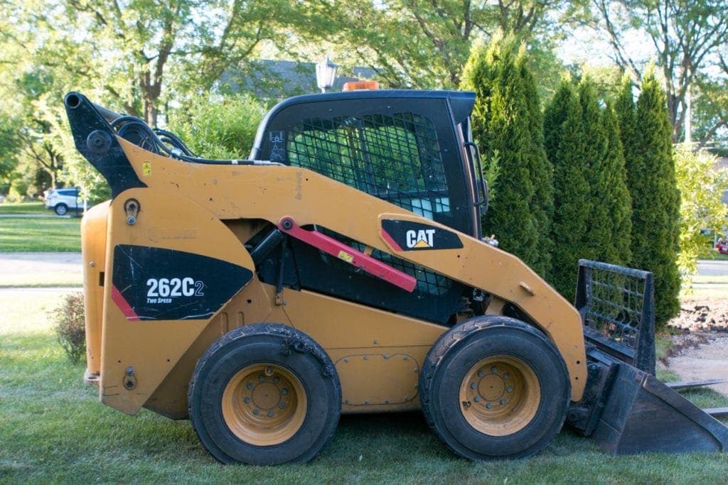updating landscaping with a digger