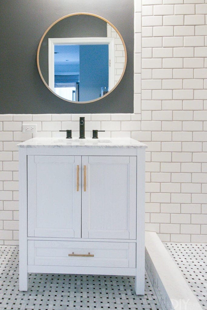 How to hang a bathroom mirror above your vanity