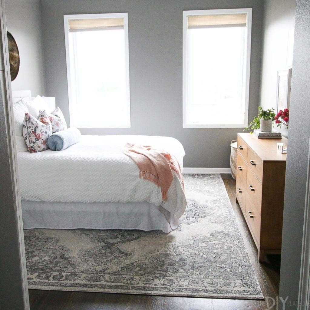 A gray guest bedroom in the color Chelsea Gray