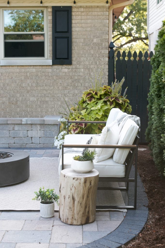 Outdoor couch on this exterior home tour