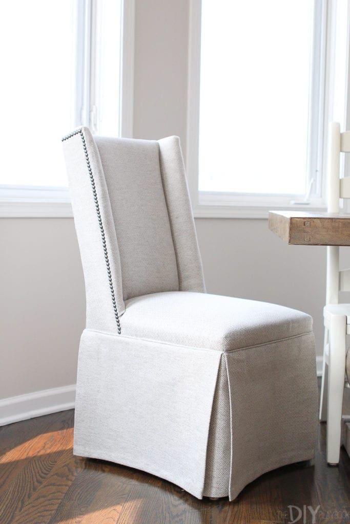 Upholstered end chairs with farmhouse style table