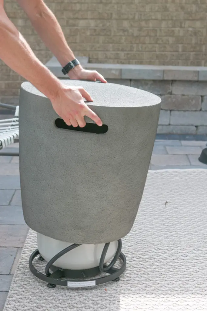 A tutorial on how to hide a propane tank that comes from your patio's fire pit
