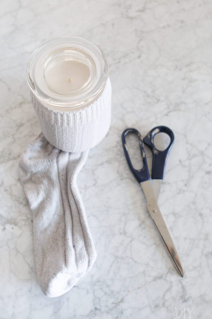 Covering a candle with an old sock